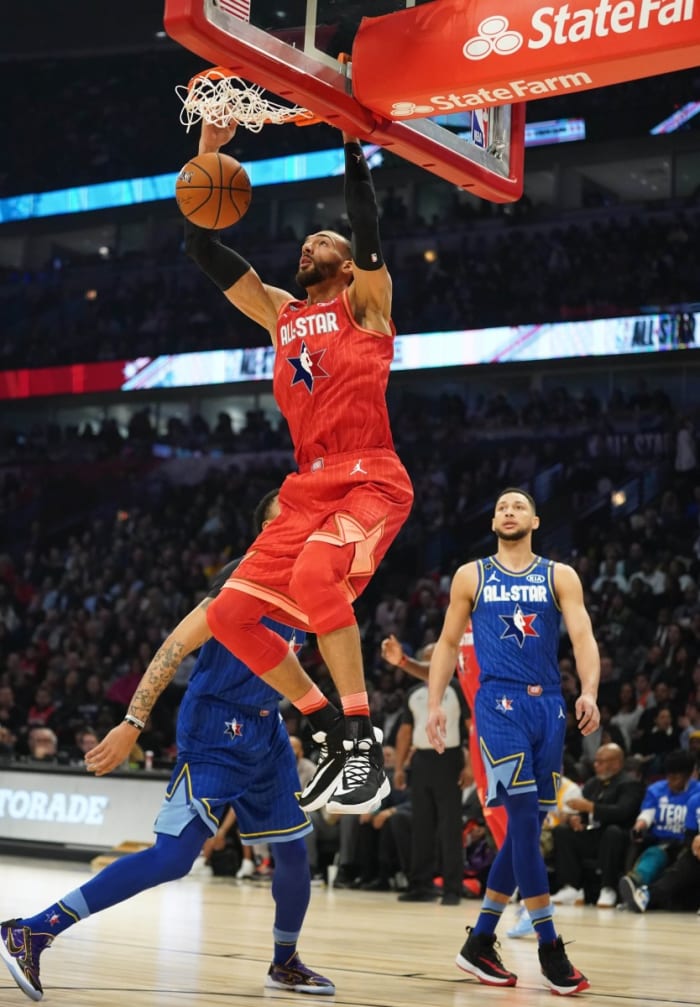 Rudy Gobert (Red) dunks over Anthony Davis (Blue) and Ben Simmons (Blue) during the 2020 All-Star Game